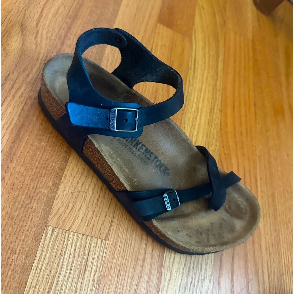 Birkenstocks black with back strap.